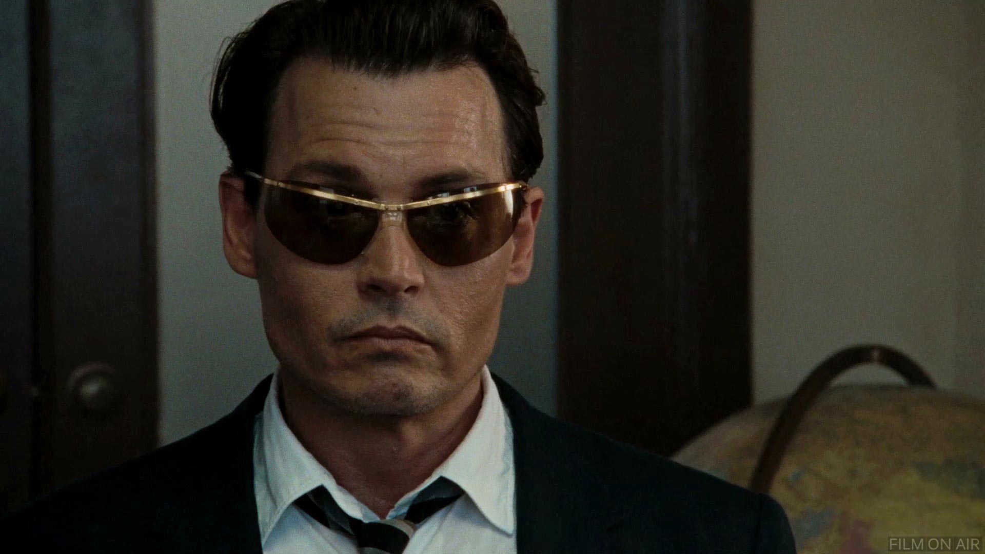 Glasses
 in The Rum Diary in The Rum Diary