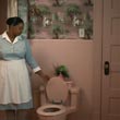 Minny Closes Toilet
 in The Help