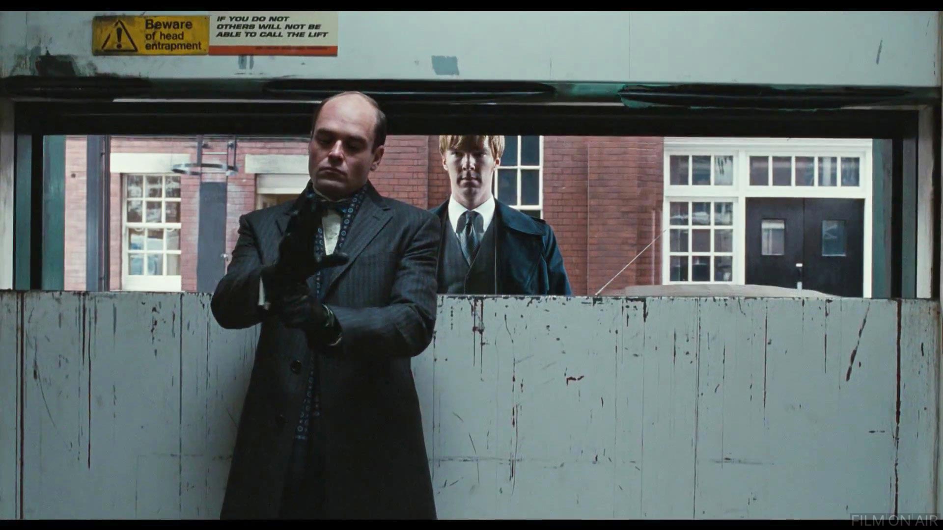 Behind Esterhase
 in Tinker Tailor Soldier Spy in Tinker Tailor Soldier Spy