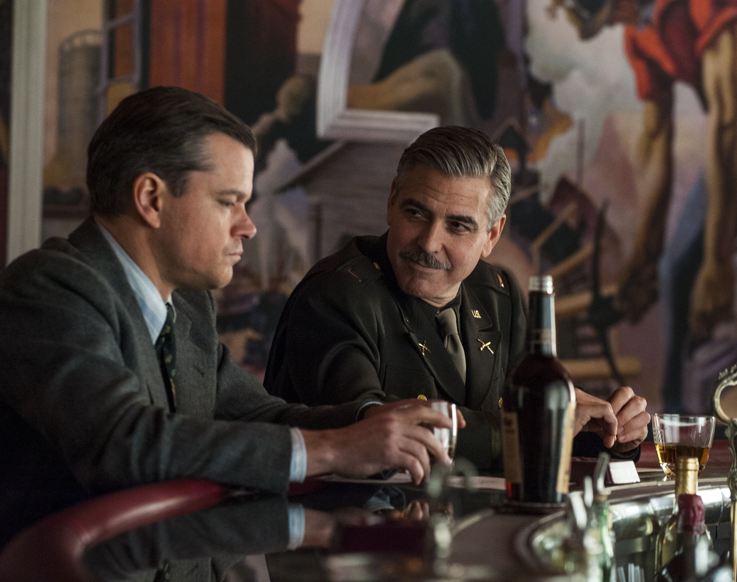 Matt Damon and George Clooney have a drink