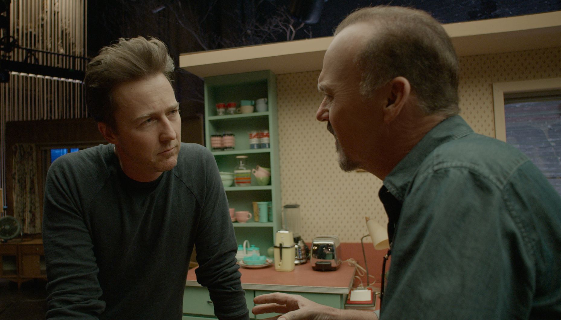 Michael Keaton and Edward Norton having a discussion in Bird