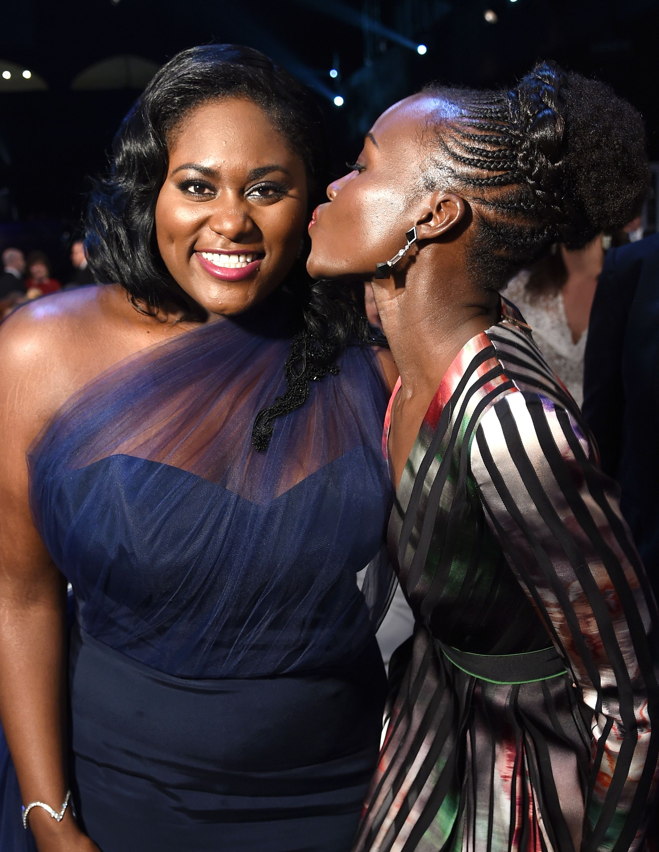 Danielle Brooks in purple getting a kiss at 2015 SAG Awards